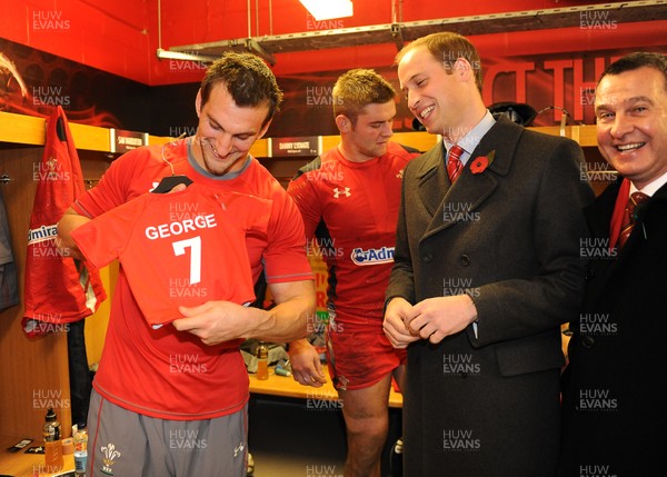 091113  - Wales v South Africa - 2013 Dove Men Series - Prince William is given a kit by Sam Warburton of Wales after the game in the changing room