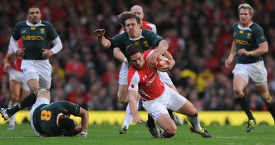 13.11.10 - Wales v South Africa - Invesco Perpetual Series 2010 - George North of Wales is tackled by Francois Steyn of South Africa. 