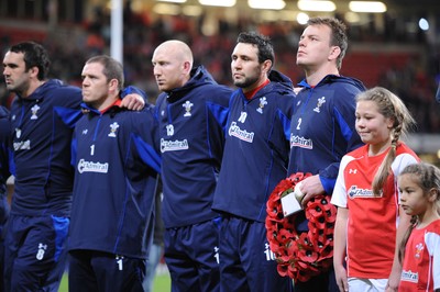 13.11.10 - Wales v South Africa - Invesco Perpetual Series 2010 - Jonathan Thomas, Paul James, Tom Shanklin, Stephen Jones and Matthew Rees line up for the national anthems with mascots Leona and Ruby Cook. 