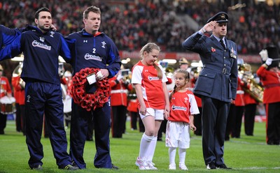 13.11.10 - Wales v South Africa - Invesco Perpetual Series 2010 - Stephen Jones and Matthew Rees line up for the national anthems with mascots Leona and Ruby Cook. 