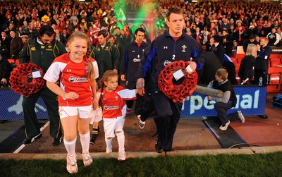 13.11.10 - Wales v South Africa - Invesco Perpetual Series 2010 - Wales captain Matthew Rees leads out his team with mascots Leona and Ruby Cook. 