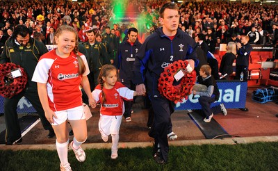 13.11.10 - Wales v South Africa - Invesco Perpetual Series 2010 - Wales captain Matthew Rees leads out his team with mascots Leona and Ruby Cook. 