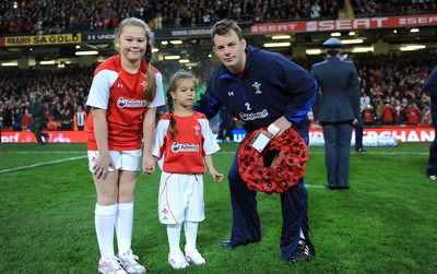 13.11.10 - Wales v South Africa - Invesco Perpetual Series 2010 - Wales captain Matthew Rees leads out his team with mascots Leona and Ruby Cook. 