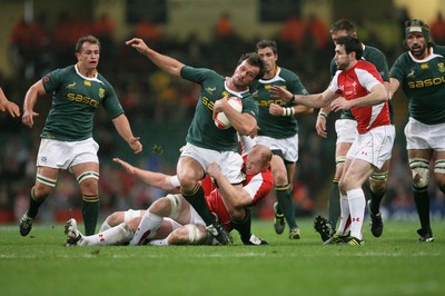 13.11.10 Wales v South Africa... South Africa's Bismarck Du Plessis is tackled by Martyn Williams. 