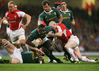 13.11.10 Wales v South Africa... South Africa's Tendai Mtwarira is tackled by Tom Shanklin. 