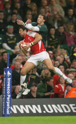 13.11.10 Wales v South Africa... James Hook and South Africa's Bjorn Basson. 