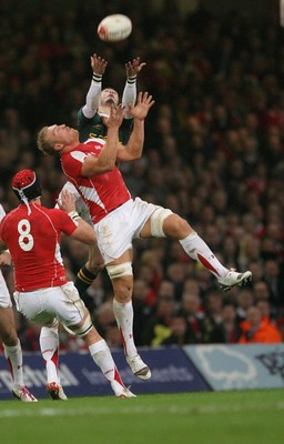 13.11.10 Wales v South Africa... Wales' Andy Powell and South Africa's Bjorn Basson. 