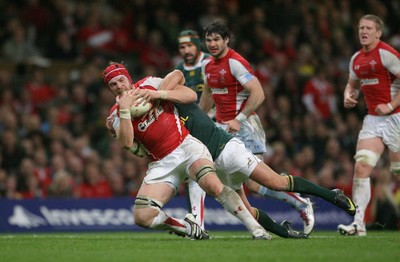 13.11.10 Wales v South Africa... Wales' Alun-Wyn Jones is tackled by South Africa's Morne Steyn. 