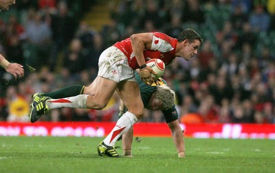 13.11.10 Wales v South Africa... Wales' Lee Byrne is tackled by South Africa's Patrick Lambie. 