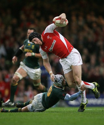 13.11.10 Wales v South Africa... Wales' Tom Shanklin is tackled by South Africa's Gio Aplin. 