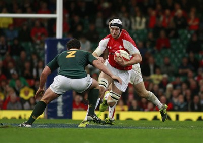 13.11.10 Wales v South Africa - Autumn International Series -   Wales' Ryan Jones takes on South Africa's Bismarck Du Plessis.  