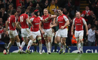 13.11.10 .. Wales v South Africa. -  Wales' George North is congratulated by team mates after his second try 