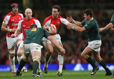 13.11.10 .. Wales v South Africa. -  Wales' George North takes on South Africa's Morne Steyn and South Africa's Bakkies Botha  