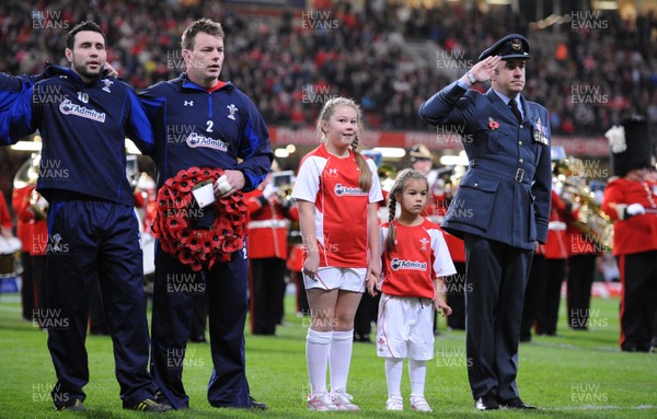 13.11.10 - Wales v South Africa - Invesco Perpetual Series 2010 - Stephen Jones and Matthew Rees line up for the national anthems with mascots Leona and Ruby Cook. 