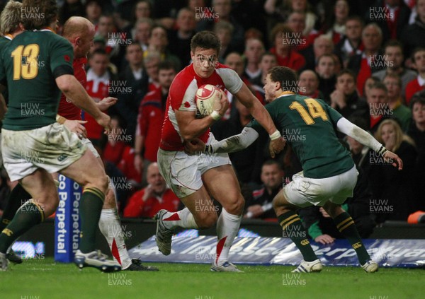 13.11.10 Wales v South Africa - Autumn International Series -   Wales' Chris Czekaj steps inside Bjorn Basson(14) as Francois Steyn covers. 