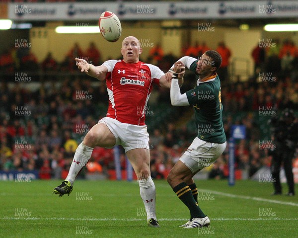 13.11.10 .. Wales v South Africa. -  South Africa's Bjorn Basson and Wales' Tom Shanklin go for the high ball 