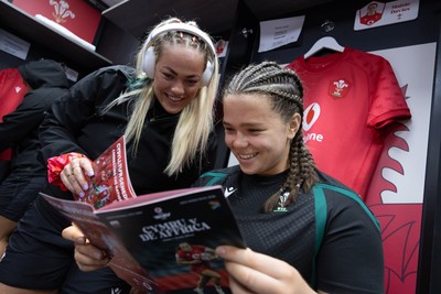180926 Wales v South Africa, Vodafone Wales WXV Series -Kelsey Jones of Wales and Maisie Davies of Wales in the changing room ahead of the match