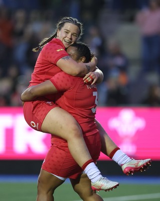 180926 Wales v South Africa, Vodafone Wales WXV Series - Maisie Davies of Wales celebrates with Sisilia Tuipulotu of Wales after she races in to score try