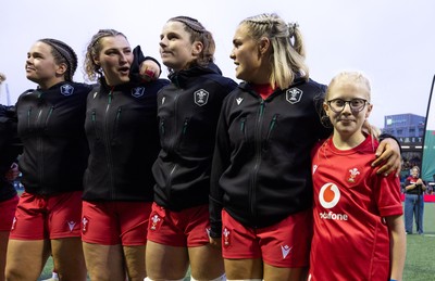 190926 Wales v South Africa, Vodafone Wales WXV Series - Match mascot Lola Snowdon with Wales co-captains Alex Callender and Kate Williams
