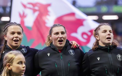 190926 Wales v South Africa, Vodafone Wales WXV Series - Maisie Davies of Wales, Gwenllian Pyrs of Wales and Kate Williams of Wales during the anthems