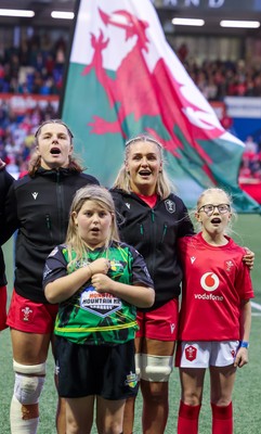 190926 Wales v South Africa, Vodafone Wales WXV Series - Match mascot Lola Snowdon with Wales co-captains Alex Callender and Kate Williams