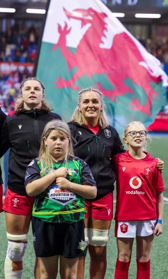 190926 Wales v South Africa, Vodafone Wales WXV Series - Match mascot Lola Snowdon with Wales co-captains Alex Callender and Kate Williams