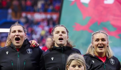 190926 Wales v South Africa, Vodafone Wales WXV Series - Gwenllian Pyrs of Wales, Kate Williams of Wales and Alex Callender of Wales during the anthems