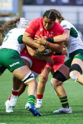 190926 Wales v South Africa, Vodafone Wales WXV Series - Sisilia Tuipulotu of Wales is held as she charges forward