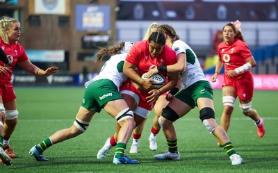 190926 Wales v South Africa, Vodafone Wales WXV Series - Sisilia Tuipulotu of Wales is held as she charges forward