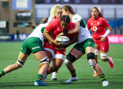 190926 Wales v South Africa, Vodafone Wales WXV Series - Sisilia Tuipulotu of Wales is held as she charges forward