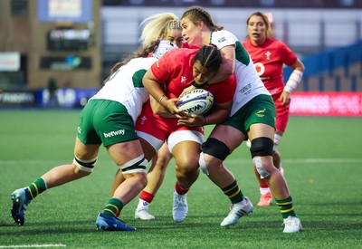 190926 Wales v South Africa, Vodafone Wales WXV Series - Sisilia Tuipulotu of Wales is held as she charges forward