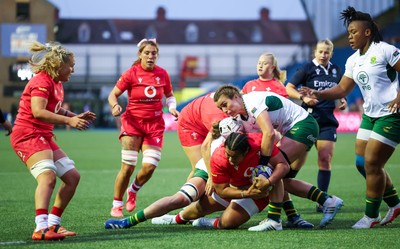 190926 Wales v South Africa, Vodafone Wales WXV Series - Sisilia Tuipulotu of Wales is held as she charges forward