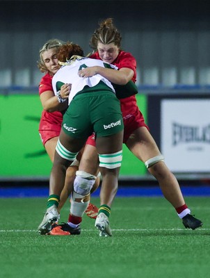 190926 Wales v South Africa, Vodafone Wales WXV Series - Wales co-captain Alex Callender and Wales co-captain Kate Williams tackle Vainah Ubisi of South Africa