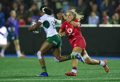 190926 Wales v South Africa, Vodafone Wales WXV Series - Alex Callender of Wales looks to tackle Aphiwe Ngwevu of South Africa