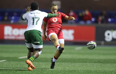 190926 Wales v South Africa, Vodafone Wales WXV Series - Lleucu George of Wales kicks past Xoliswa Khuzwayo of South Africa