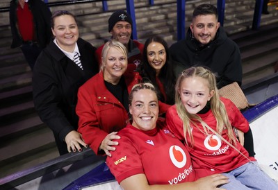 190926 Wales v South Africa, Vodafone Wales WXV Series - Kelsey Jones of Wales with family and friends at the end of the match