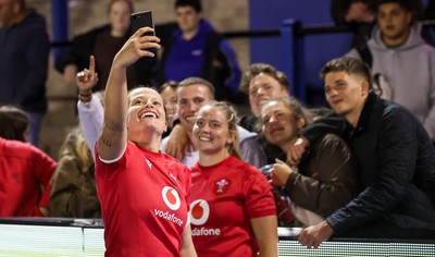 190926 Wales v South Africa, Vodafone Wales WXV Series - Amy Williams of Wales and Freya Bell of Wales have a selfie with fans at the end of the match