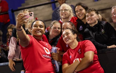 190926 Wales v South Africa, Vodafone Wales WXV Series - Sisilia Tuipulotu of Wales and Courtney Keight of Wales with fans at the end of the match