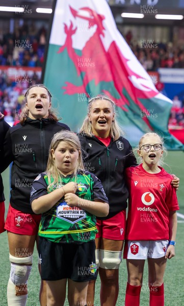 190926 Wales v South Africa, Vodafone Wales WXV Series - Match mascot Lola Snowdon with Wales co-captains Alex Callender and Kate Williams