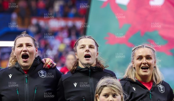 190926 Wales v South Africa, Vodafone Wales WXV Series - Gwenllian Pyrs of Wales, Kate Williams of Wales and Alex Callender of Wales during the anthems