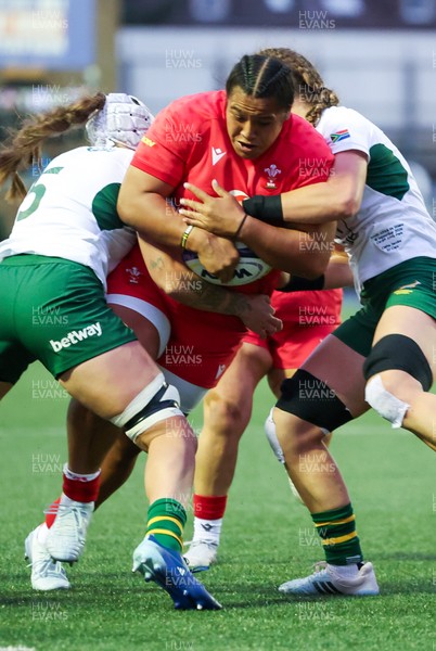 190926 Wales v South Africa, Vodafone Wales WXV Series - Sisilia Tuipulotu of Wales is held as she charges forward