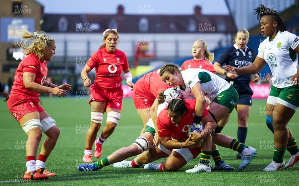 190926 Wales v South Africa, Vodafone Wales WXV Series - Sisilia Tuipulotu of Wales is held as she charges forward