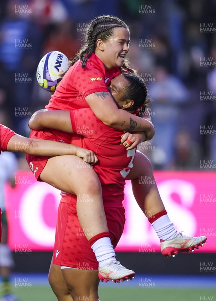 190926 Wales v South Africa, Vodafone Wales WXV Series - Maisie Davies of Wales celebrates with Sisilia Tuipulotu of Wales after she races through to score try