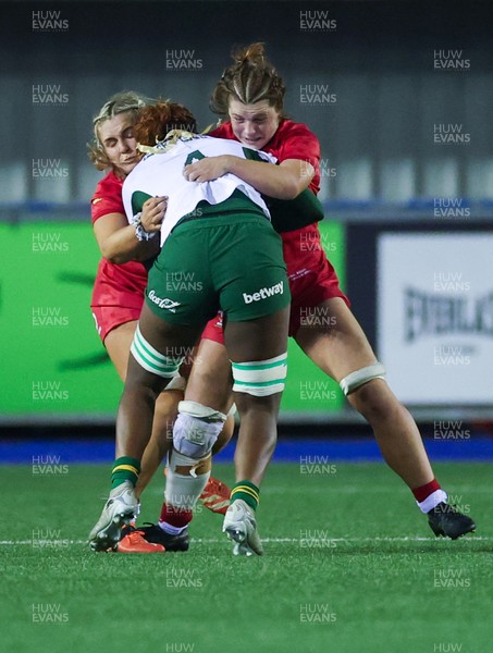 190926 Wales v South Africa, Vodafone Wales WXV Series - Wales co-captain Alex Callender and Wales co-captain Kate Williams tackle Vainah Ubisi of South Africa