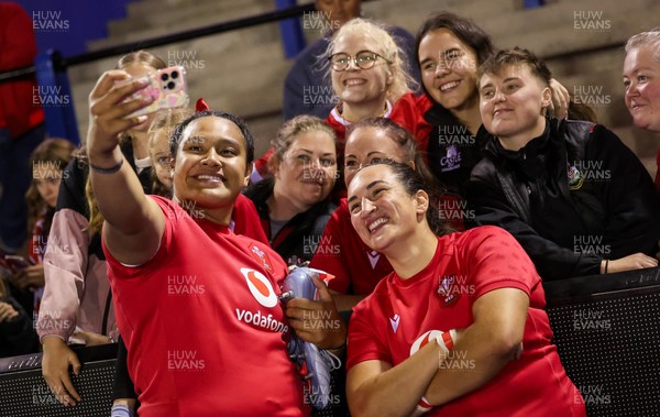 190926 Wales v South Africa, Vodafone Wales WXV Series - Sisilia Tuipulotu of Wales and Courtney Keight of Wales with fans at the end of the match