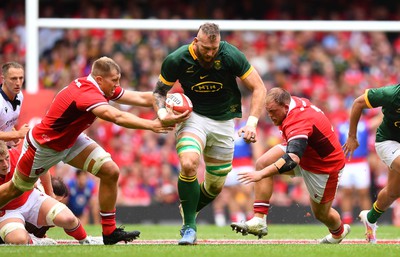 190823 - Wales v South Africa - Vodaphone Summer Series - RG Snyman of South Africa is tackled by Ben Carter and Corey Domachowski of Wales