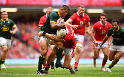 190823 - Wales v South Africa - Vodaphone Summer Series - Malcolm Marx of South Africa is tackled by Johnny Williams of Wales