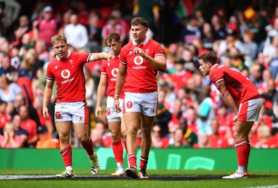 190823 - Wales v South Africa - Vodaphone Summer Series - Sam Costelow of Wales consoles Mason Grady of Wales