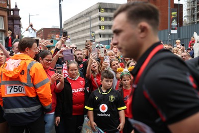 190823 - Wales v South Africa - Vodafone Summer Series - Fans watch as the Wales team walk into the stadium