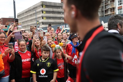 190823 - Wales v South Africa - Vodafone Summer Series - Fans watch as the Wales team walk into the stadium